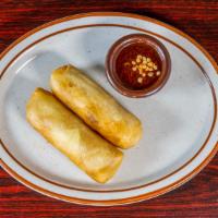 Spring Rolls (2) · Deep fried wonton wrapper stuffed with carrot, cabbage, bean thread noodle. Served with plum...