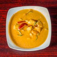 Panang Curry · Panang curry paste with coconut milk, zucchini, carrot and bell pepper, bamboo shoot, snow p...