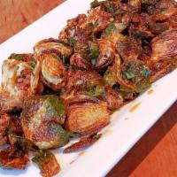 Crispy Brussels Sprouts & Cauliflower · Chilli-soy glaze