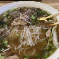 Pho Tai, Bo Nae · Rice noodle soup with beef round steak and well-done brisket.