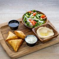 Veggie Samosa  · Three pieces of samosas with salad ,and hummus