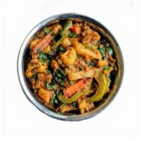 Veggie Sabgi · Vegan. Sauteed mixed vegetables topped with curry sauce.