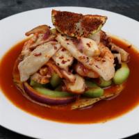 Tostada Pa'L Plebe* · Callo de acha, camarón cocido, pulpo, pepino y cebolla morada. 
Scallops, cooked shrimp, oct...