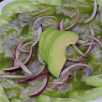 Aguachile Verde* · Camarones curtidos en limón y salsa picosa verde, aguacate, pepino, cebolla y tomate. 
Shrim...