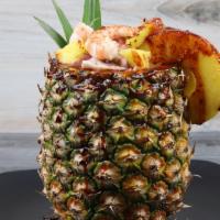 Piña Mazatlán · Piña preparada con camarones cocidos y pulpo.  Pineapple prepared with cooked shrimp and oct...