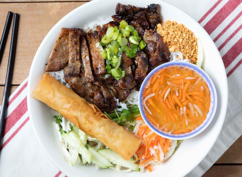 Char-Grilled Marinated Pork & Egg Roll / Bún Heo Nướng Chả Giò · Served with vermicelli noodle.
