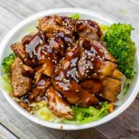 Teriyaki Chicken & Vegetables Bowl · charbroiled chicken with steam vegetables with teriyaki sauce on top of white rice