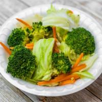 Steamed Vegetables · Broccoli, carrots and napa cabbage.