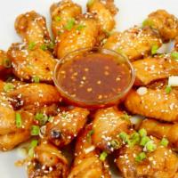 Party Wings (Traditional Bone-In) · Marinated Mix ＆ Match Traditional (Bone-In) glazed with Sweet ＆ Spicy flavor from our house-...