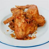 Hat Yai 3 Pcs Whole Wings · Hand battered marinated Thai herbs chicken wings, topped with fried shallots, served with st...