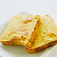 Cheese Bread · Fresh Baked Bread topped with sweet House made Cheese