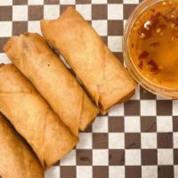 Spring Rolls · 4 Pcs Deep Fried Vegetable Spring Rolls Served with House made Sweet and Sour Sauce