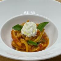 Gemelli Alla Sorrentina · Tomato sauce, fresh mozzarella, basil, Parmigiano