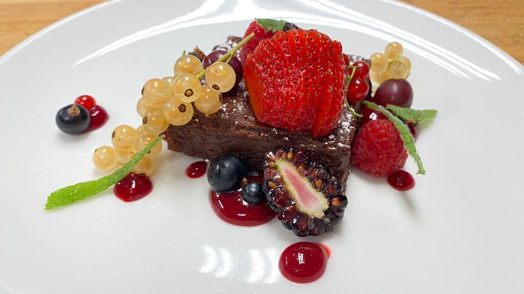 Cioccolatino · Flourless, Port Wine Infused Chocolate Cake, Raspberry Sauce