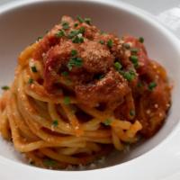 Spaghettoni · Crispy	Pancetta, San Marzano Tomato Sauce, Onions, Bell Pepper, Pecorino Romano.
