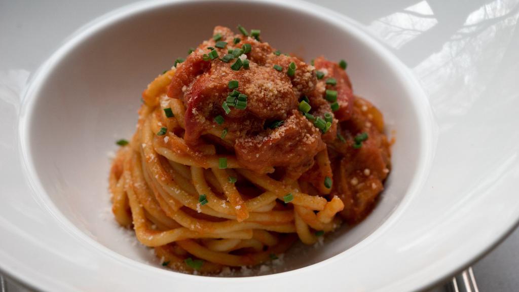Spaghettoni · Crispy	Pancetta, San Marzano Tomato Sauce, Onions, Bell Pepper, Pecorino Romano.