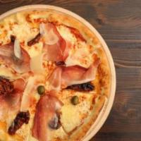 Fig & Pancetta Pizza · Chunks of fig and diced pancetta are paired with caramelized onion, goat cheese, mozzarella ...