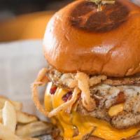 The Hangover Burger · Heart healthy. American cheese, over-easy egg, fried onion, tomato, bacon, code sauce.