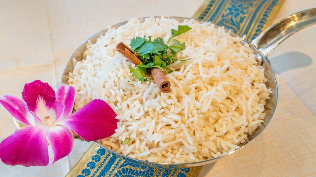 Jeera Rice · Basmati rice cooked with saffron and cumin seeds.