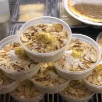 Muhallabia · Syrian milk pudding with coconut and almonds. pistachio.