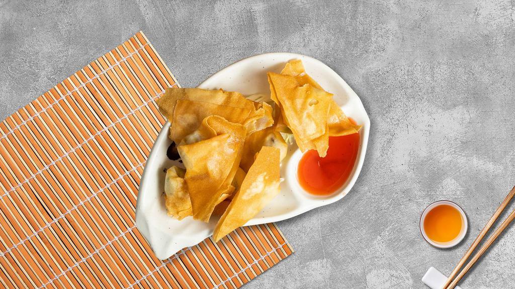 Crab Rangoon · (6 pieces) Crab and cream cheese stuffed wonton skin deep fried and served with sweet and sour sauce.