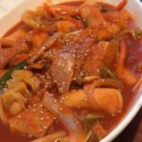 Spicy Rice Cakes  떡볶이 · Stir-fried rice cakes, onions, scallions, and fish cakes with spicy red chili paste (Ramen n...