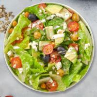 Mediterranean Salad · Tomatoes, cucumbers, Kalamata olives, onions, green peppers, feta cheese, and homemade Itali...