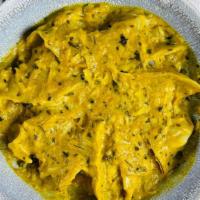 Momo Korma (10 Pieces)  · Flavorful cashew curry made with plenty of spices, cream that’s buttery and completely delic...
