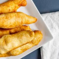 Festival · Traditional Jamaican fried bread with a hint of sweetness.