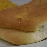 Coco Bread · A Caribbean staple bread baked with coconut milk and slightly sweet. It is often eaten stuff...