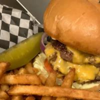 Double Deluxe ¼ Lb. Burger · Undercooked. With American cheese, lettuce tomato and pickle. Onion Rings, Potato Salad, Col...