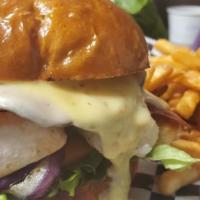 Cordon Bleu Burger · 6oz. chicken breast with Bacon, Ham swiss cheese lettuce tomato sautéed onions and honey on ...