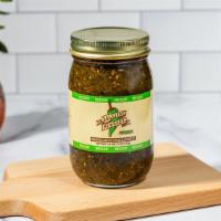 Green Tomatillo Salsa · Our Green tomatillo salsa is a delicious roasted blend of heat and citrus flavor! This tangy...