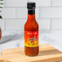 Hell Fire Hot Sauce · Our hot sauce is a fiery, bold flavored chile sauce. Put our hot sauce on everything from eg...