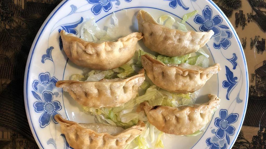 A105 Pan Fried Pot Stickers (6) · All handmade dumplings to savor your appetite. Pork and cabbage.
