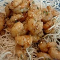 S03 Sesame Shrimp · Spicy. Shrimp marinated in garlic and wine sauce, sautéed with green onion and sesame seed, ...