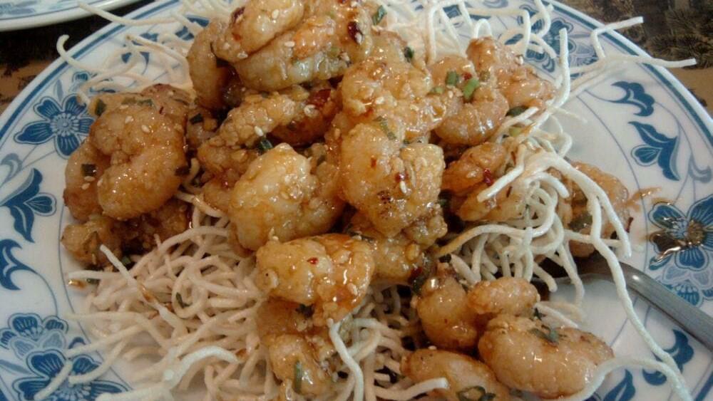 S03 Sesame Shrimp · Spicy. Shrimp marinated in garlic and wine sauce, sautéed with green onion and sesame seed, with rice noodles.