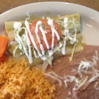 Enchiladas (4) · 4 corn tortillas filled with your choice of meat. Topped with lettuce, pico de gallo, cotija...