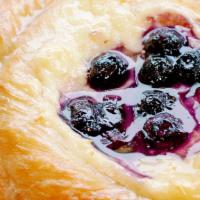 Blueberry Danish Rolls · This flaky pastry is lightly sweetened with a citrus glaze and blueberries with Mascarpone c...