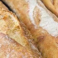 Baguette (Each) · This long bread is just the right amount of crispy on the outside, with a soft and pillowy i...