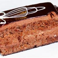 Chocolate Mousse Cake · Alternating layers of chocolate genoise flavoured with a hint of Grand Marnier chocolate mou...