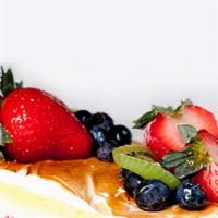 Champagne Mousse · Raspberry-soaked pear halves immersed in a light Brut champagne mousse, all topped off with ...