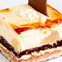 Pear Caramel  Mousse · Caramel mousse with caramel-soaked pears lie on top of layers of almond and chocolate biscui...