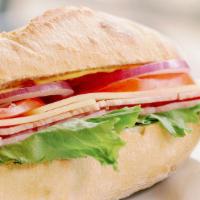 Ham And Swiss Baguette Sandwich · Ham, swiss cheese, lettuce, tomato, onion, mayonnaise, mustard on baguette