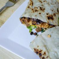 Burrito · Black beans, sour cream, shredded cheese, and lettuce and sauce, wrapped in a flour tortilla.