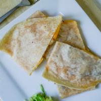 Quesadilla · Flour tortilla, your choice of meat, sour cream, shredded cheese, lettuce and your choice of...