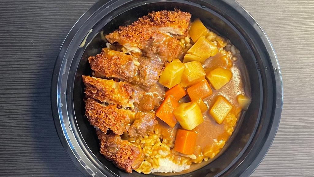 Curry Pork Tonkotsu Rice Bowl · Pork Tonkatsu, Vegetable (Carrots and Potatoes), Rice, Sesame Seed and Curry Sauce