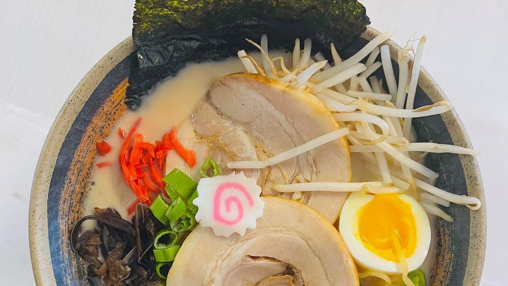 Spicy Tonkotsu Ramen · (Pork Broth) Toppings: Pork, Egg, Ginger, Bamboo Shoots, Sesame Seed, bean sprouts, Fried garlic, Dry Seaweed, Green Onion, home made spicy sauce