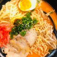 Spicy Miso Ramen · (Sesame + Soybean Paste) Toppings: Pork, Egg, Bamboo Shoots, Sesame Seed, Bean Sprout, Corn,...