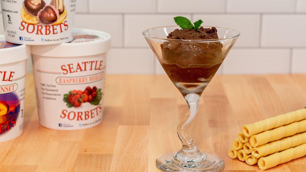 French Chocolate Sorbet · Pint.  Our chocolate syrup is prepared fresh from the best cocoa powder,  it is then blended with bittersweet chocolate and coconut milk for a creamy chocolate taste that melts in your mouth with the faintest hint of orange.